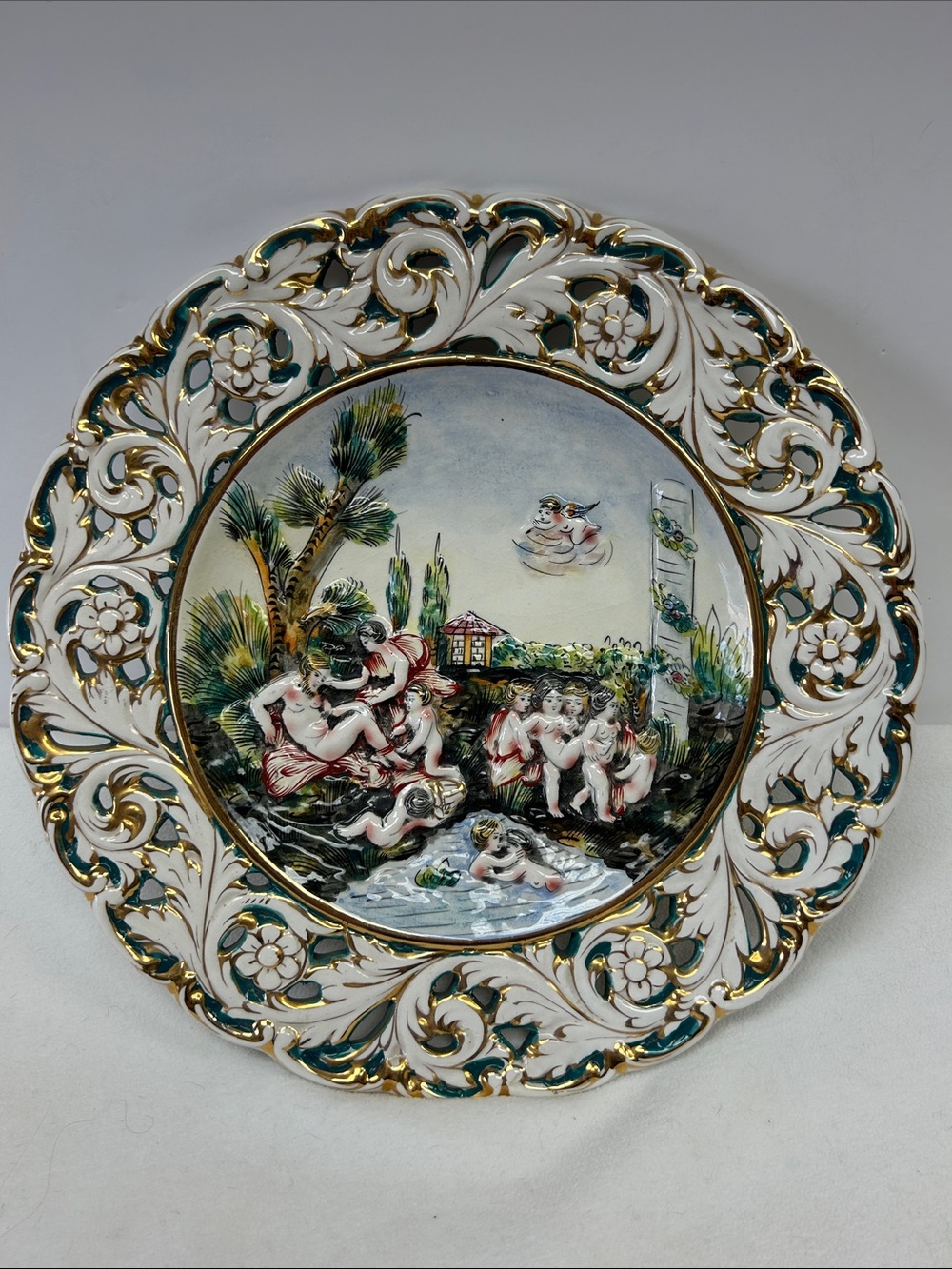 Vintage Capodimonte 14”porcelain hand painted /decorated cherub wall platter